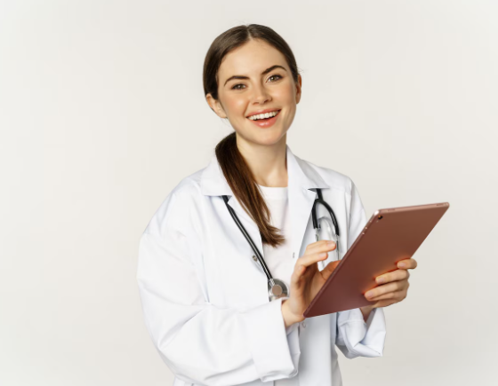 Female doctor in white coat smiling and holding a tablet, healthcare professional concept
