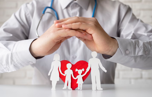 Doctor protecting family health with heart symbol representing urology, kidney care, and wellness in Noida and Preet Vihar